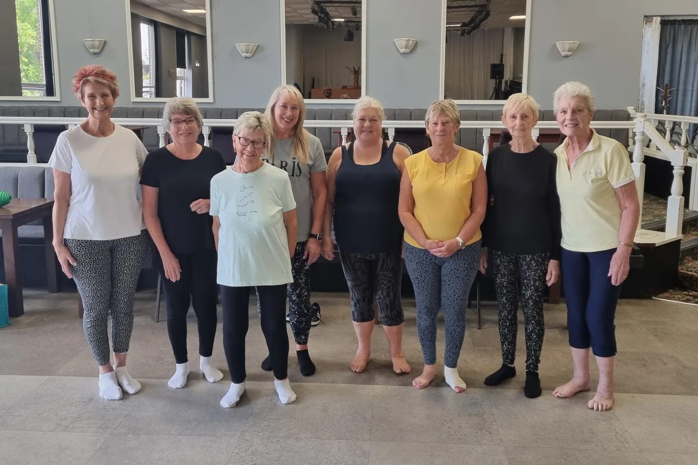 A group of older Start Right Pilates members together after a class