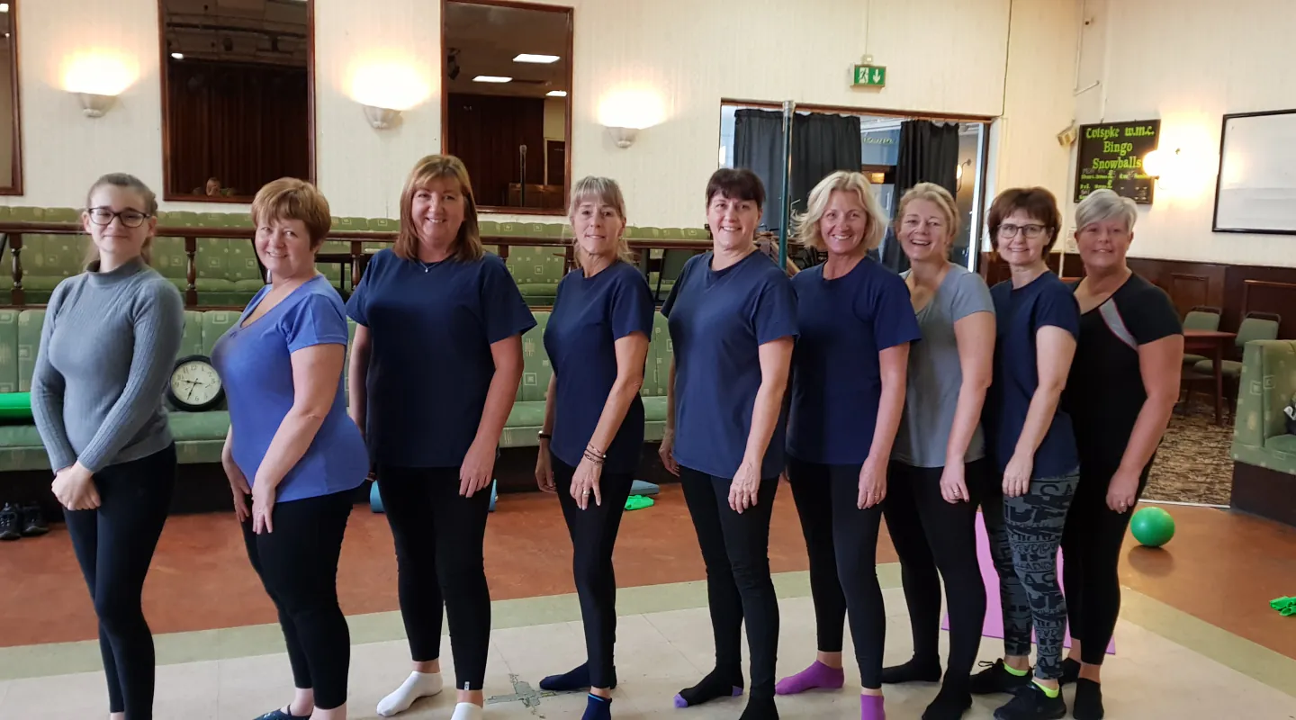 A welcoming Start Right Pilates class with members from different generations