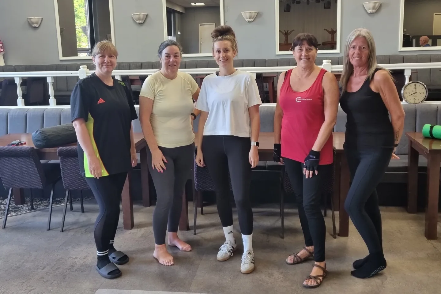 Five Start Right Pilates members together after a class